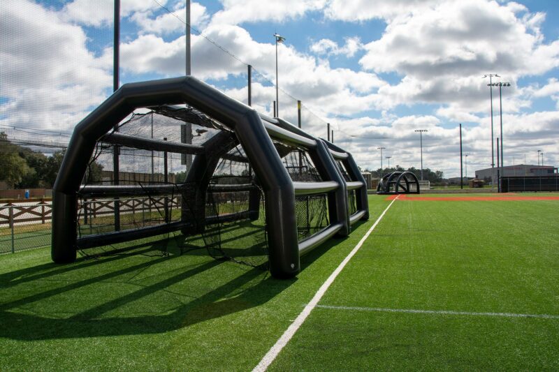 The Winning Play: Why Inflatable Batting Cages Outshine Metal on Turf Fields